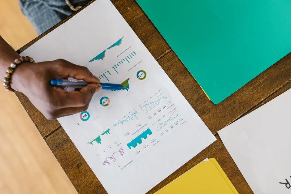 A marketing strategy document shown on a desk, highlighting the essentials of business planning.